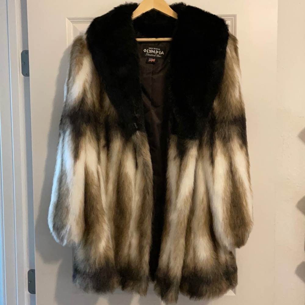 Olympia coat. Large made in the USA. Lightly used. Excellent condition.